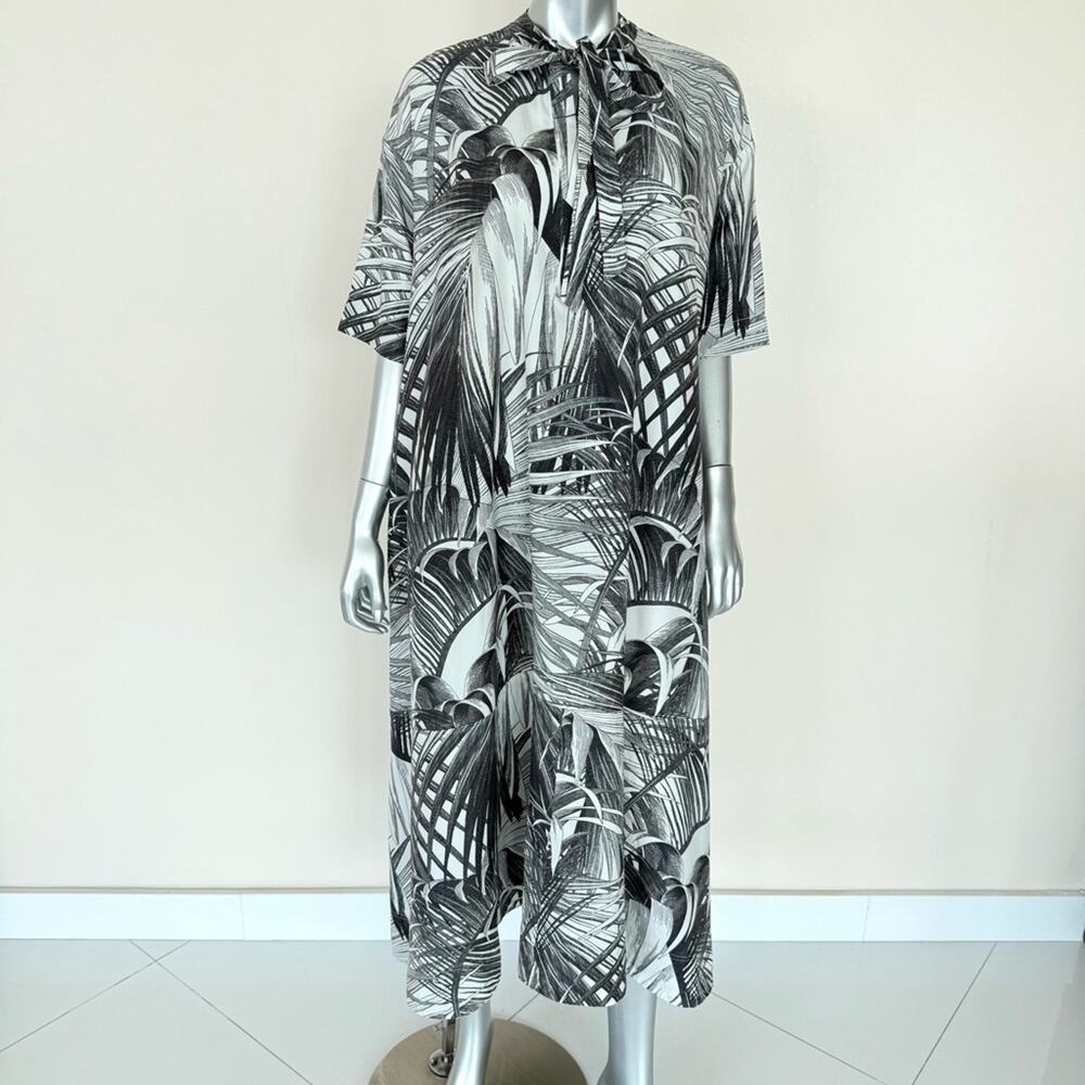 CO women dress size L Authentic Retail 1700$